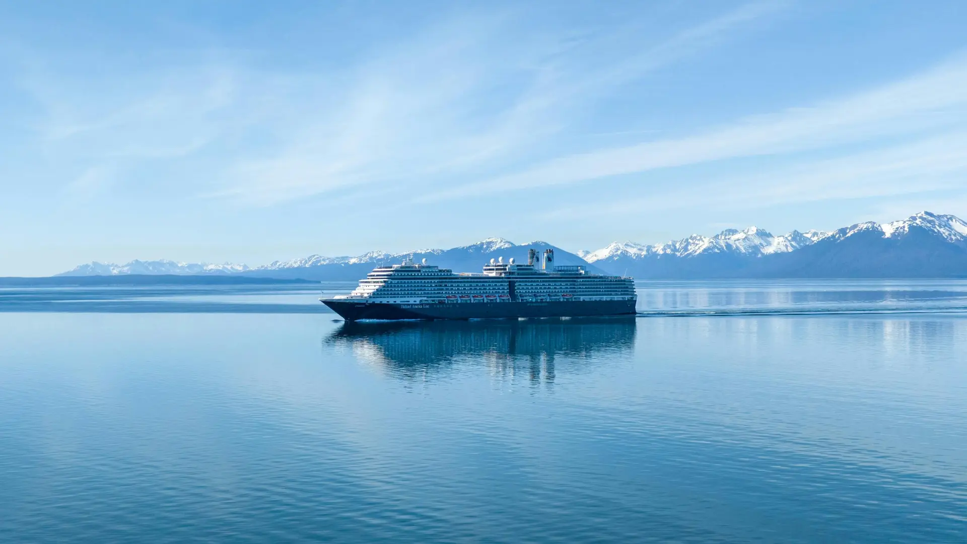 Alaska cruise passing in the scenic background of coastal landscapes.